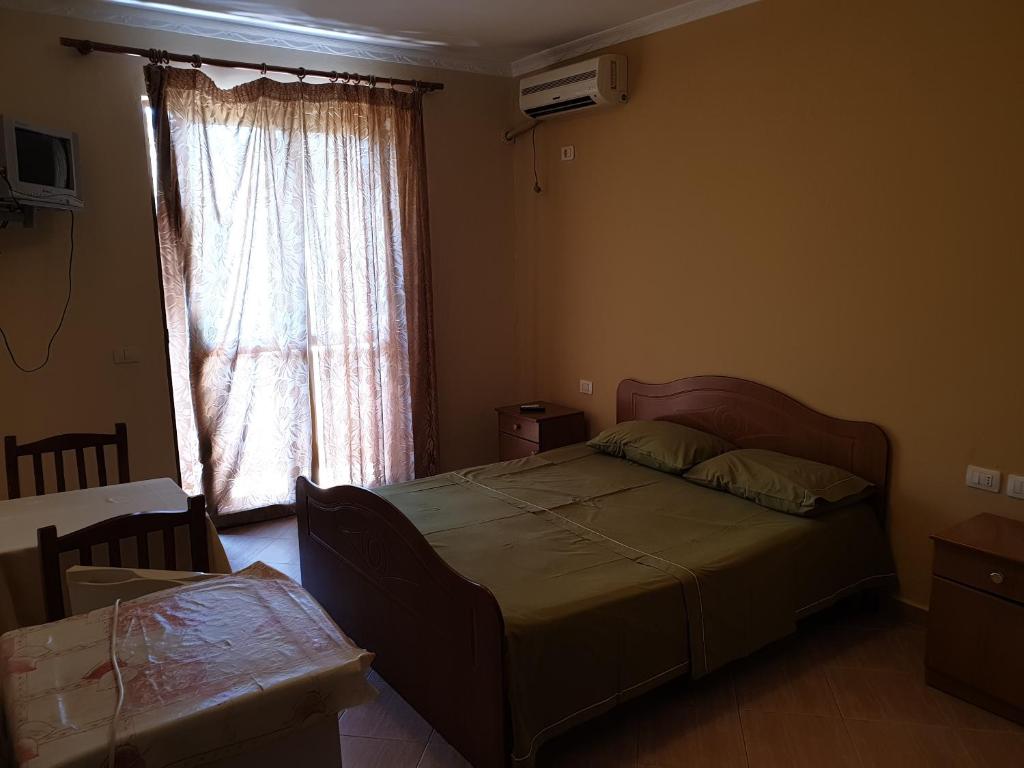 Postel nebo postele na pokoji v ubytování Hotel Palma
