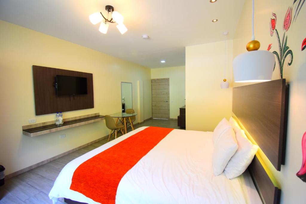 TV a/nebo společenská místnost v ubytování Monte Selva Hotel Spa Termal
