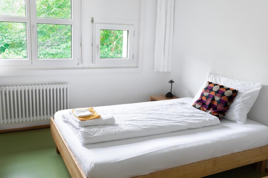Letto o letti in una camera di Seminarhotel Romerohaus