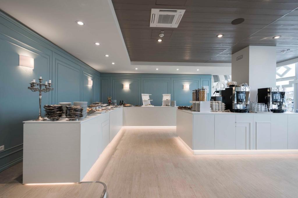 Kuchyň nebo kuchyňský kout v ubytování Hotel Principe