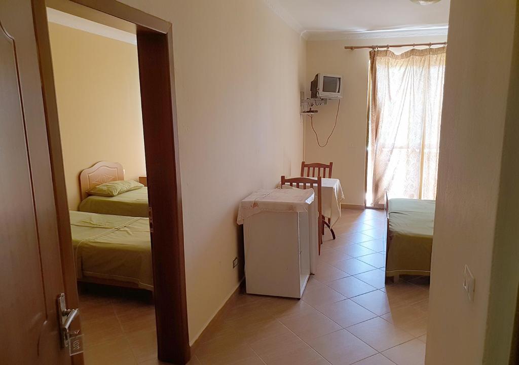 Postel nebo postele na pokoji v ubytování Hotel Palma