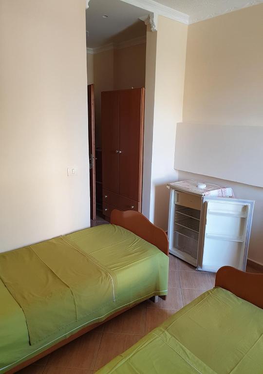 Postel nebo postele na pokoji v ubytování Hotel Palma
