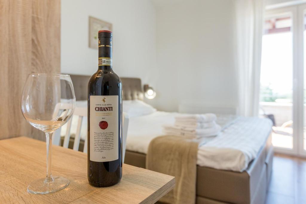 Łóżko lub łóżka w pokoju w obiekcie Villa Laura An