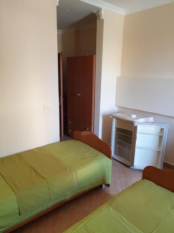 Postel nebo postele na pokoji v ubytování Hotel Palma