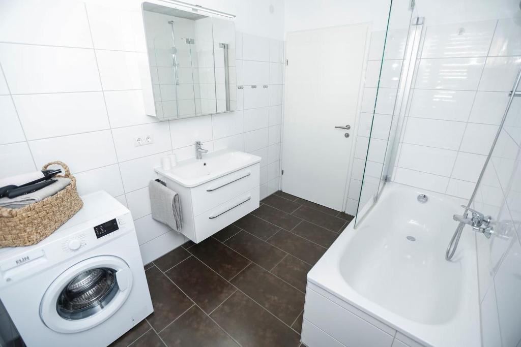 Koupelna v ubytování Gartenwohnung in prämierter Wohnanlage