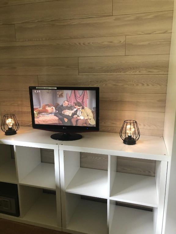 TV a/nebo společenská místnost v ubytování Cihlářka - horský apartmán