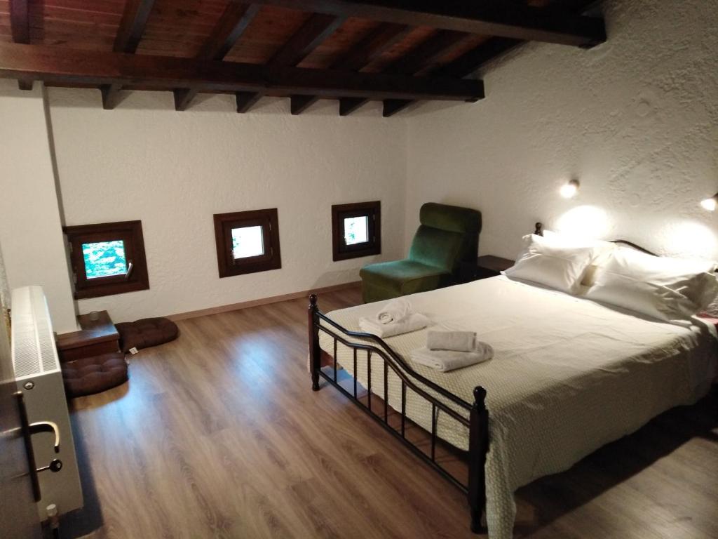 En eller flere senge i et værelse på Elatodasos