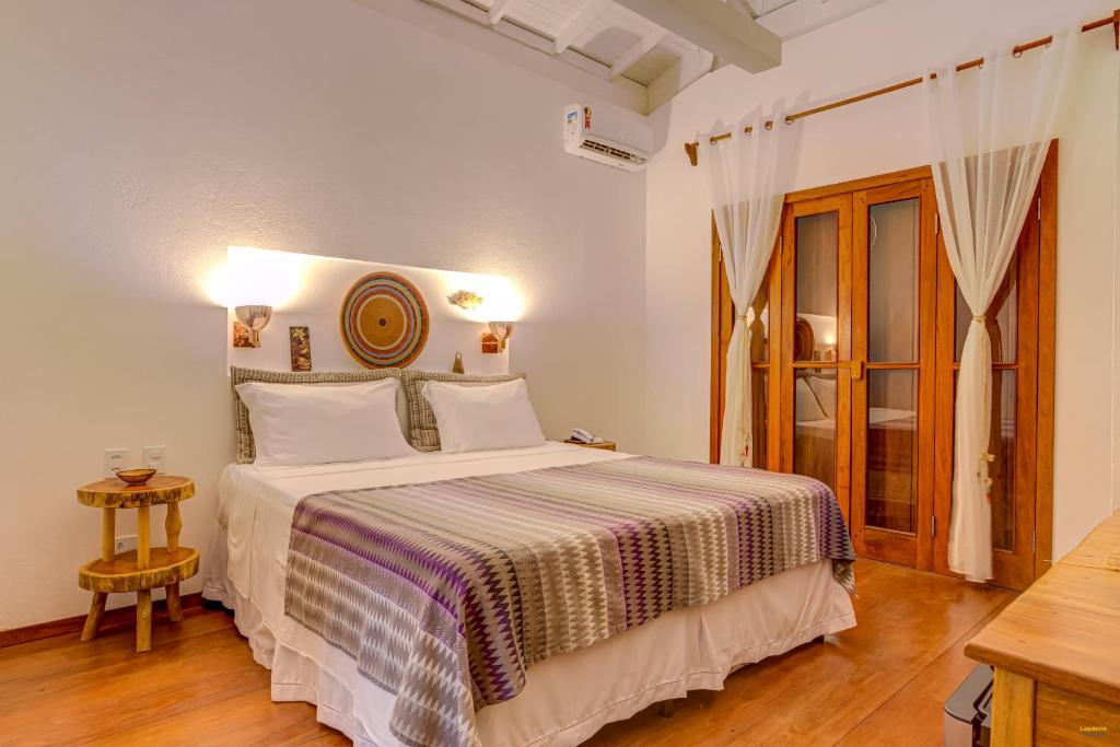 Postel nebo postele na pokoji v ubytování A Casa de Gabriella