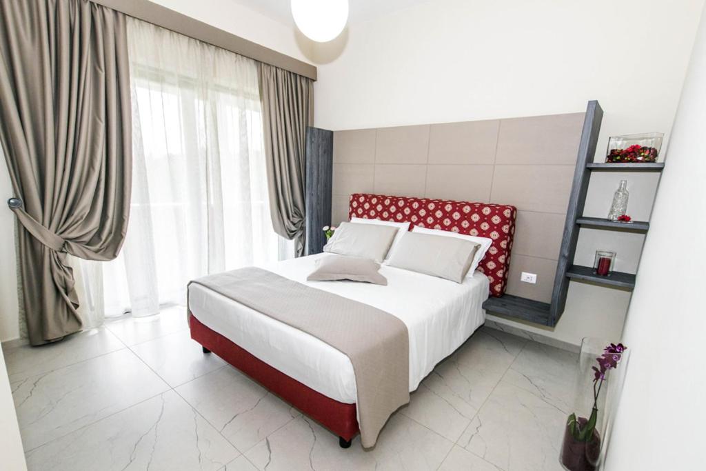 Postel nebo postele na pokoji v ubytování Agriturismo Borgo Imperiale