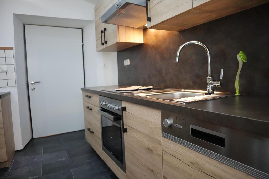 Kuchyň nebo kuchyňský kout v ubytování Ferienwohnung Lenz