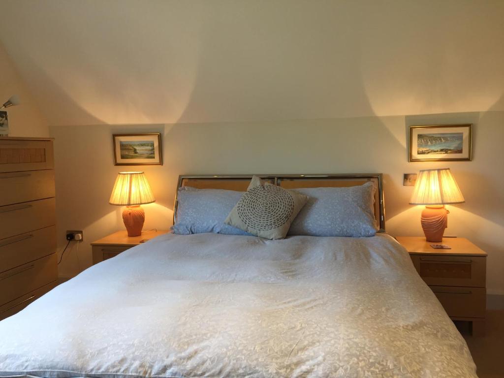Postel nebo postele na pokoji v ubytování Martlets B&B