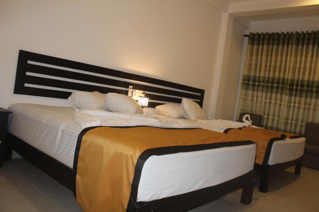 Postel nebo postele na pokoji v ubytování Hotel Senora