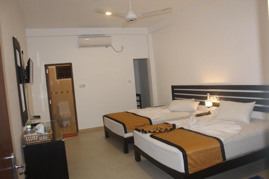 Postel nebo postele na pokoji v ubytování Hotel Senora