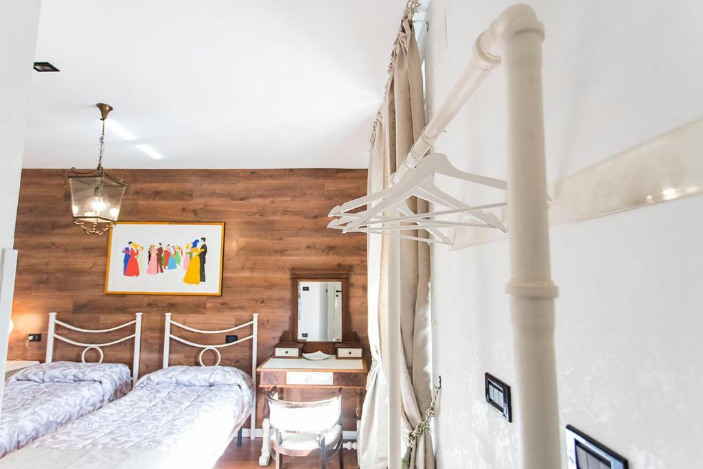 Posteľ alebo postele v izbe v ubytovaní Relais Garibaldi