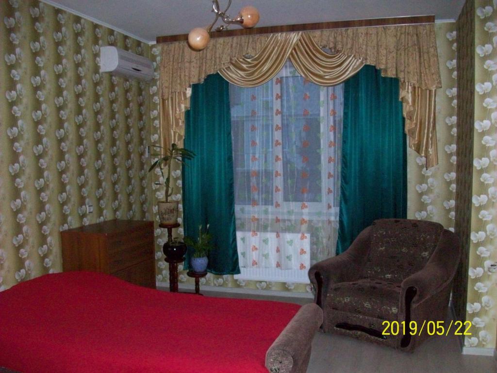 Giường trong phòng chung tại Квартира у моря