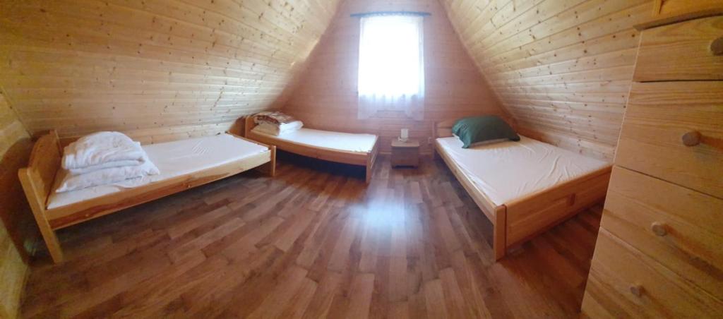 Postel nebo postele na pokoji v ubytování Przystanek Morze