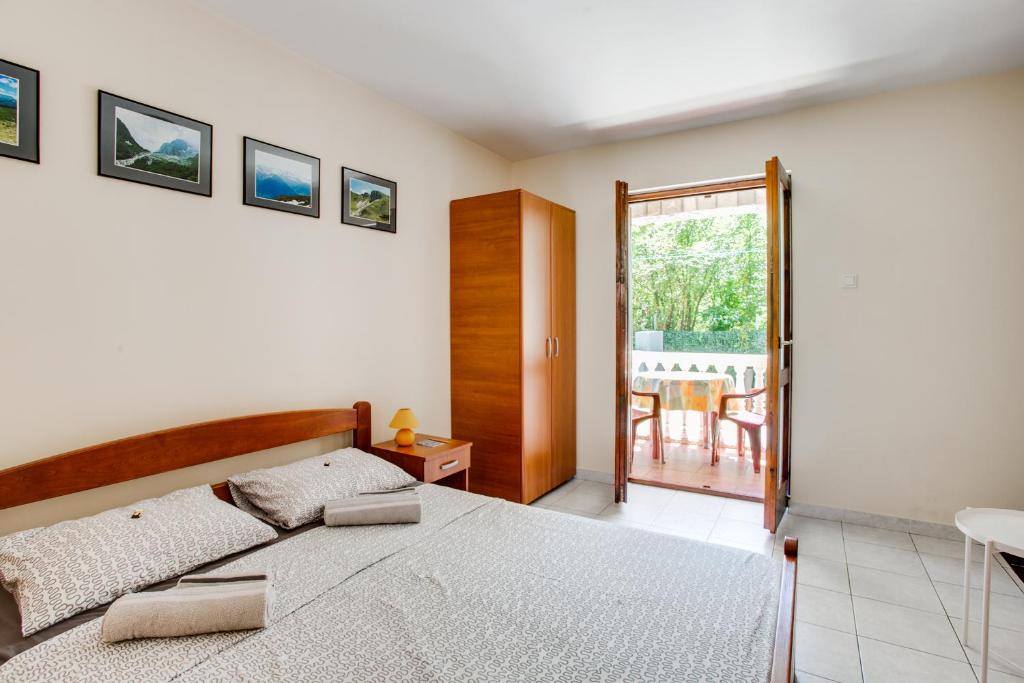 Postel nebo postele na pokoji v ubytování Villa Dionis