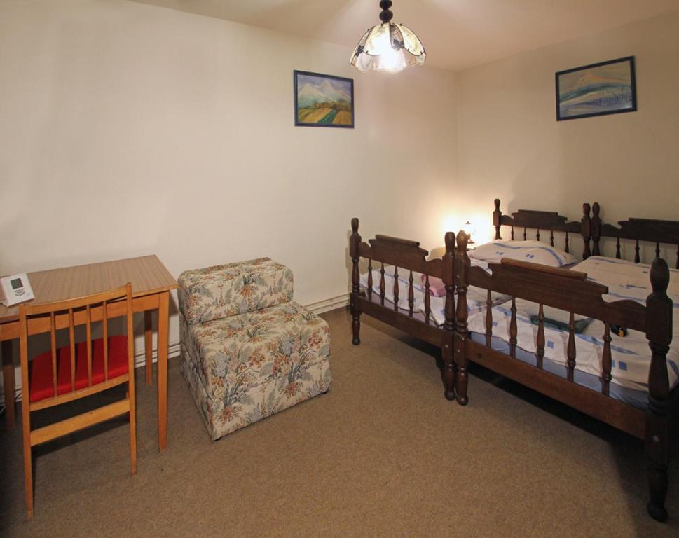 A bed or beds in a room at Privat Lucia
