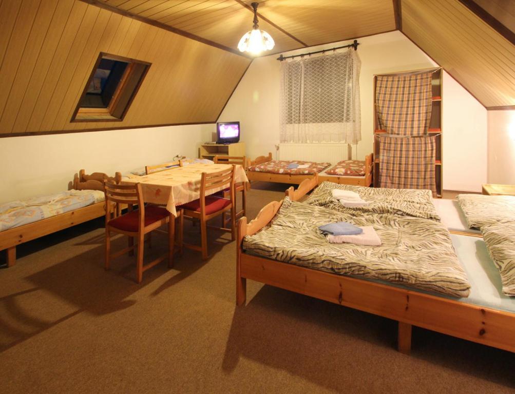 A bed or beds in a room at Privat Lucia