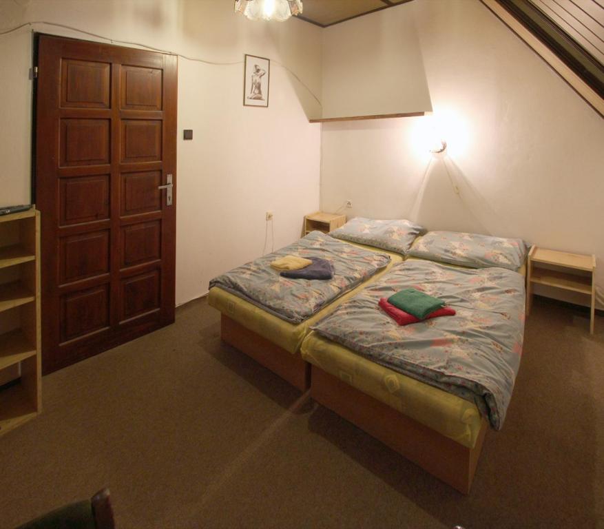 A bed or beds in a room at Privat Lucia