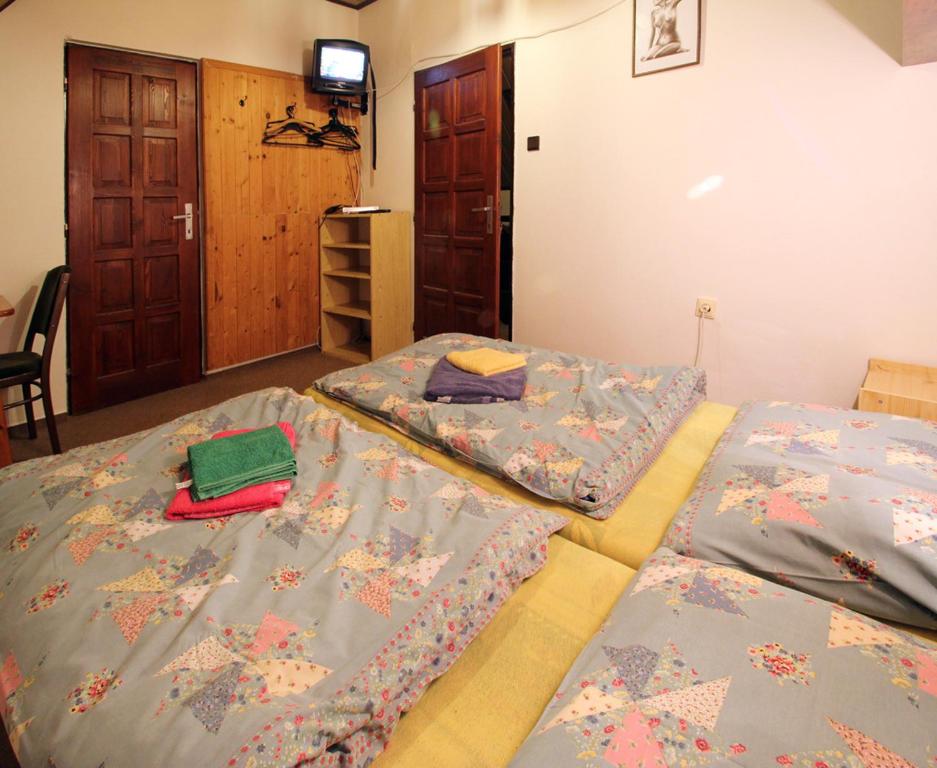 A bed or beds in a room at Privat Lucia