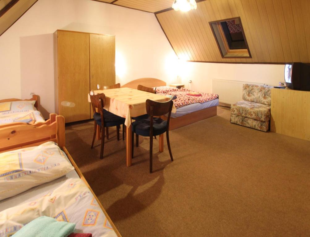 A bed or beds in a room at Privat Lucia