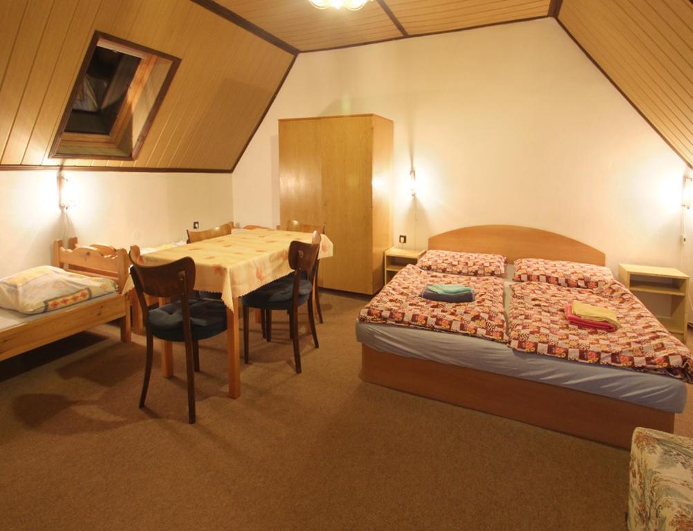 A bed or beds in a room at Privat Lucia