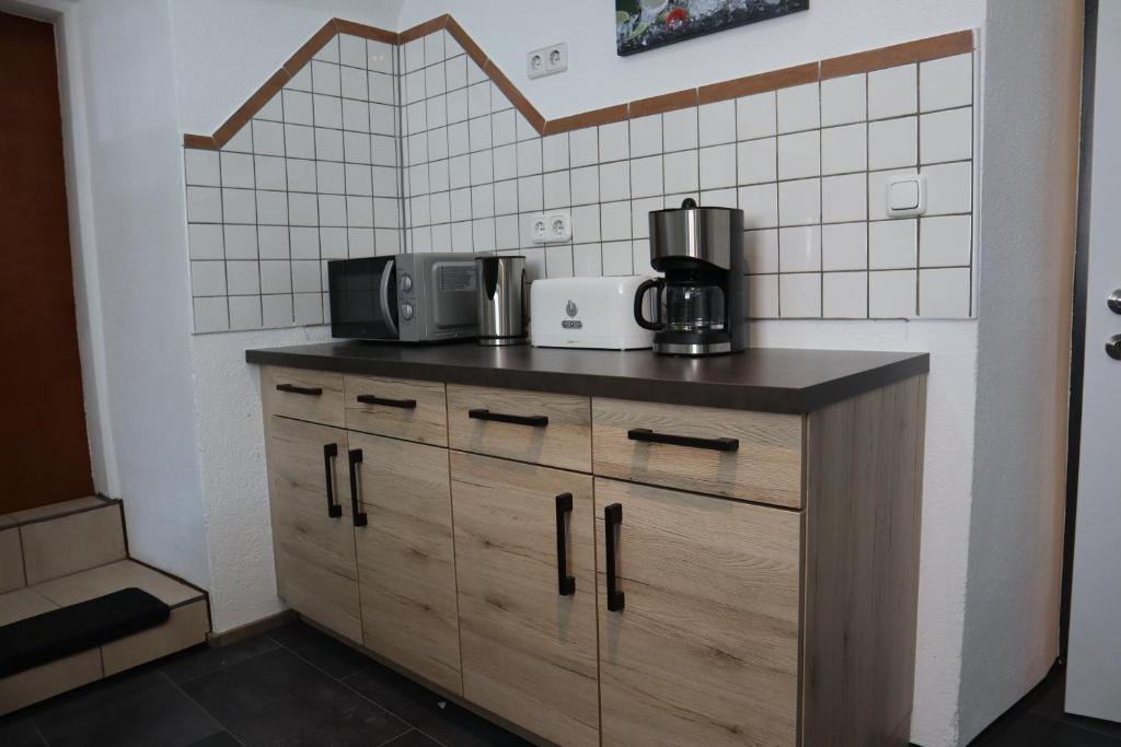 Kuchyň nebo kuchyňský kout v ubytování Ferienwohnung Lenz