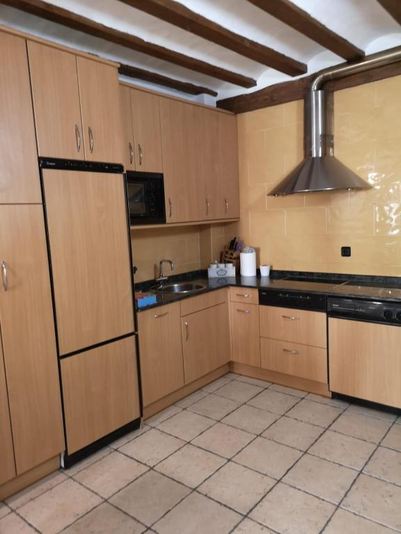 Kuchyňa alebo kuchynka v ubytovaní Estupendo Apartamento