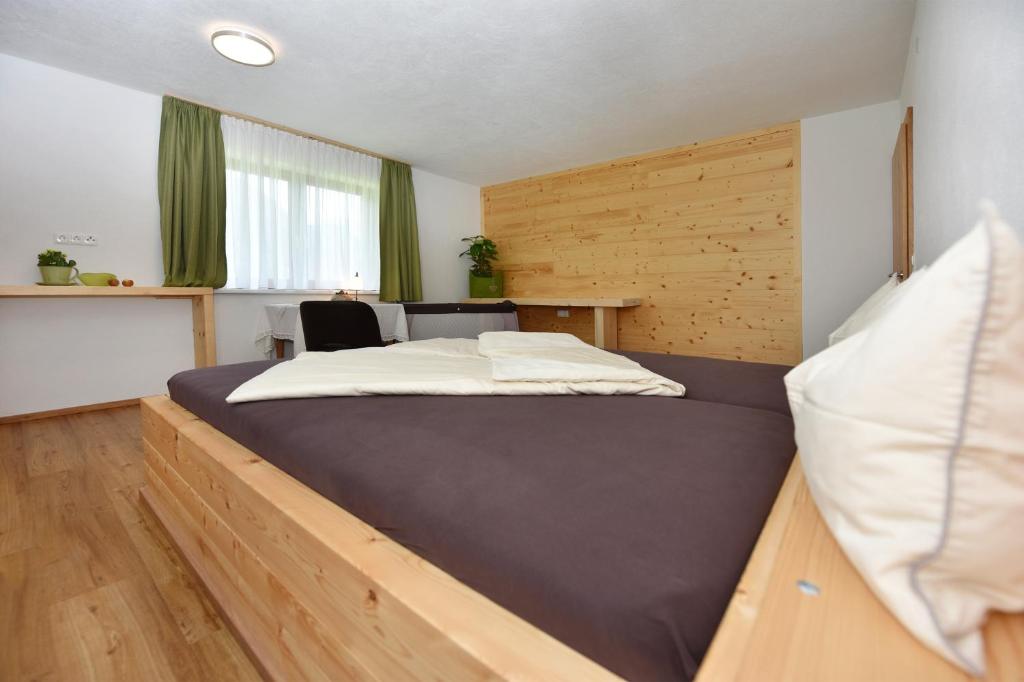 Postel nebo postele na pokoji v ubytování Mottnerhof