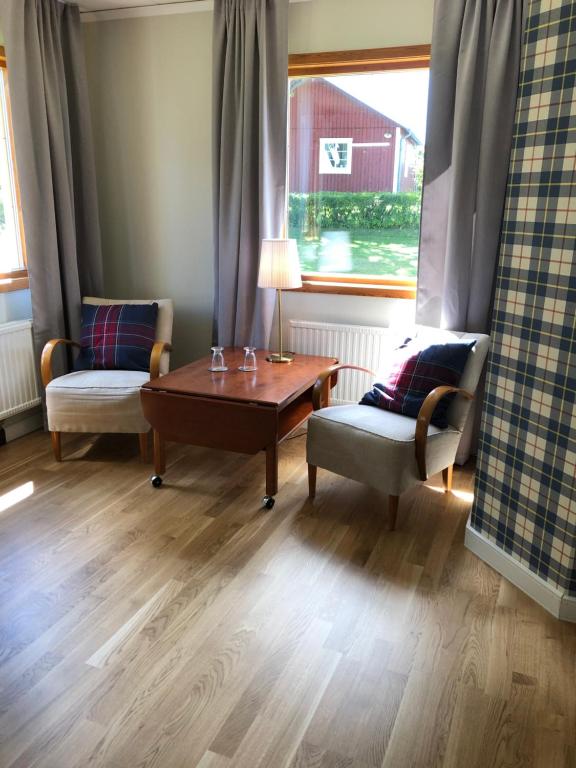 Posezení v ubytování Bjälbo Gästhus B&B
