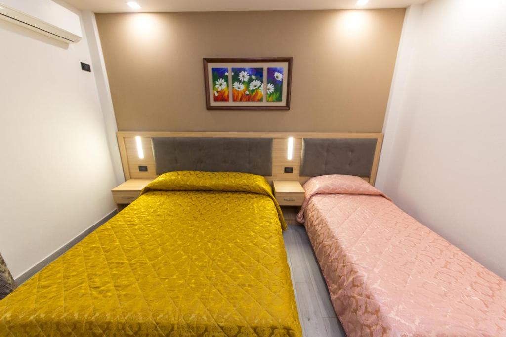 Postel nebo postele na pokoji v ubytování Western Star Hotel