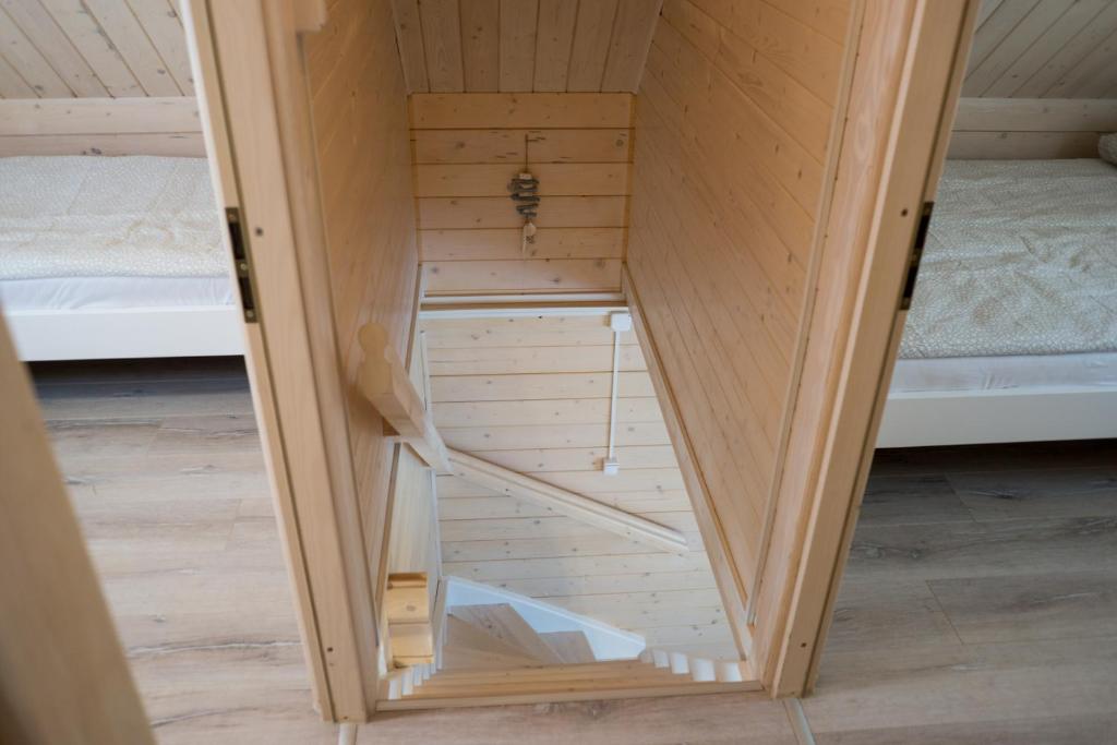 Postel nebo postele na pokoji v ubytování Te Domki