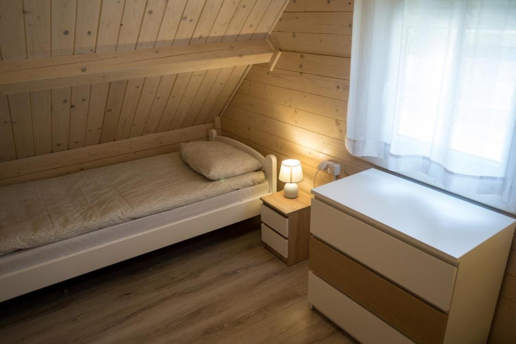 Postel nebo postele na pokoji v ubytování Te Domki