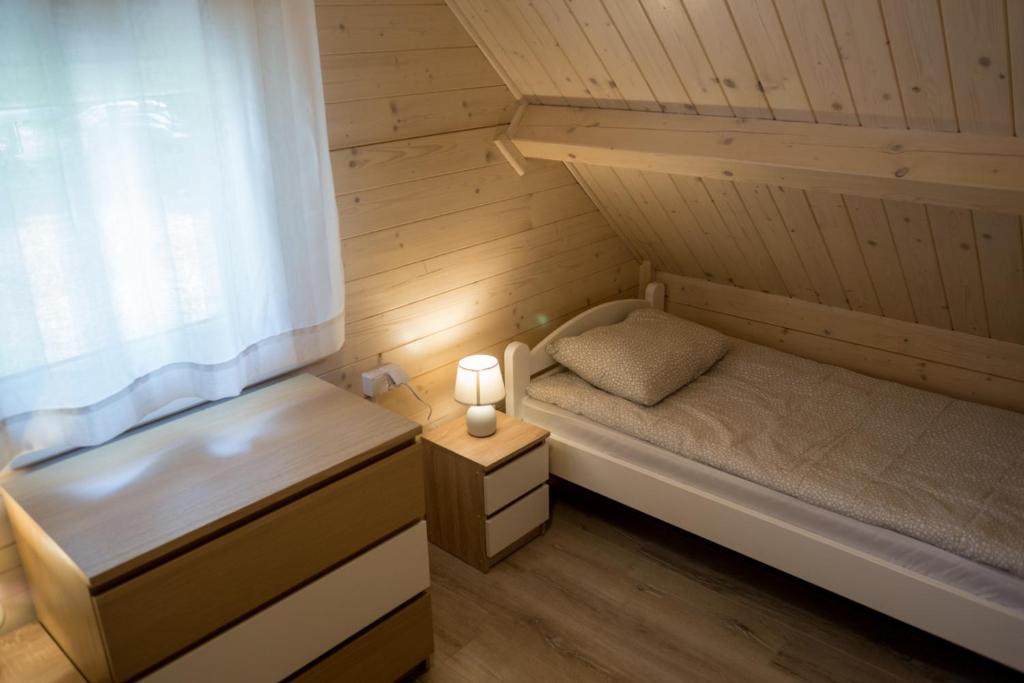 Postel nebo postele na pokoji v ubytování Te Domki