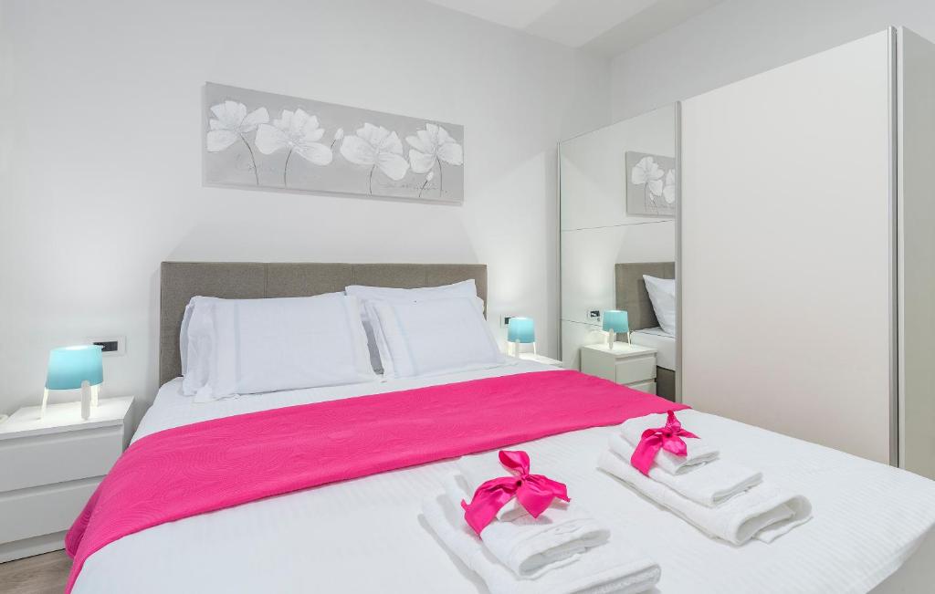 Postel nebo postele na pokoji v ubytování Apartments Vita