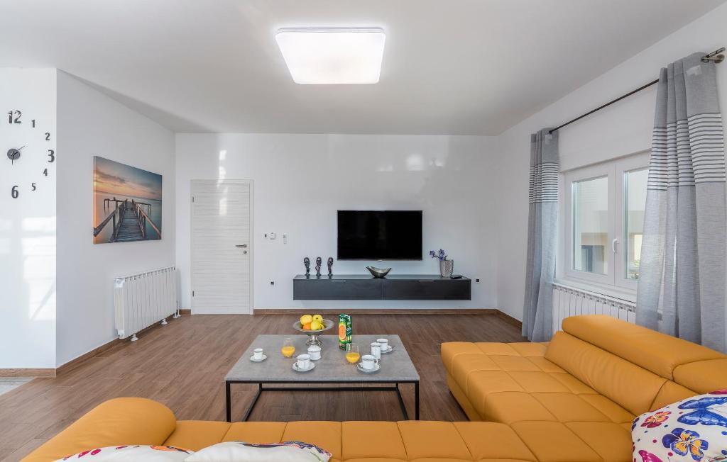 TV a/nebo společenská místnost v ubytování Apartments Vita