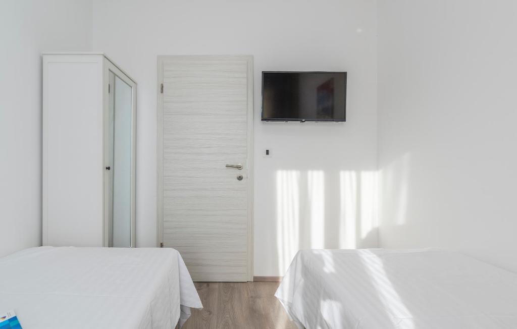 TV a/nebo společenská místnost v ubytování Apartments Vita