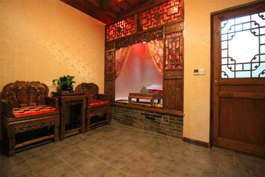 Posezení v ubytování Pingyao Hu lu wa Home Inn