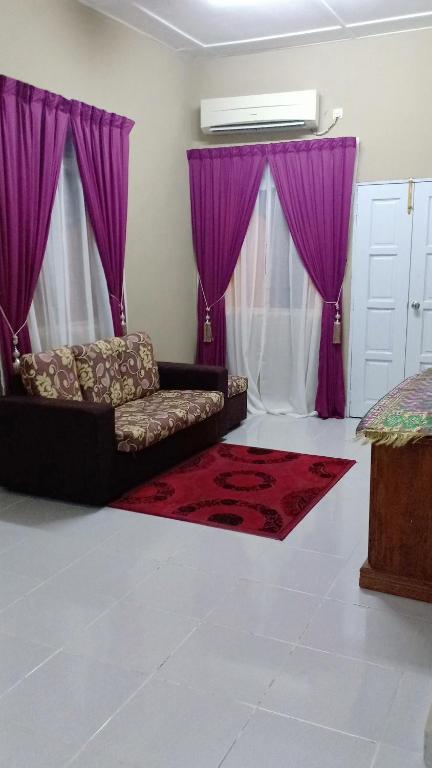 Postel nebo postele na pokoji v ubytování TEBiNG Guest House Taman Negara Malaysia Kuala Tahan