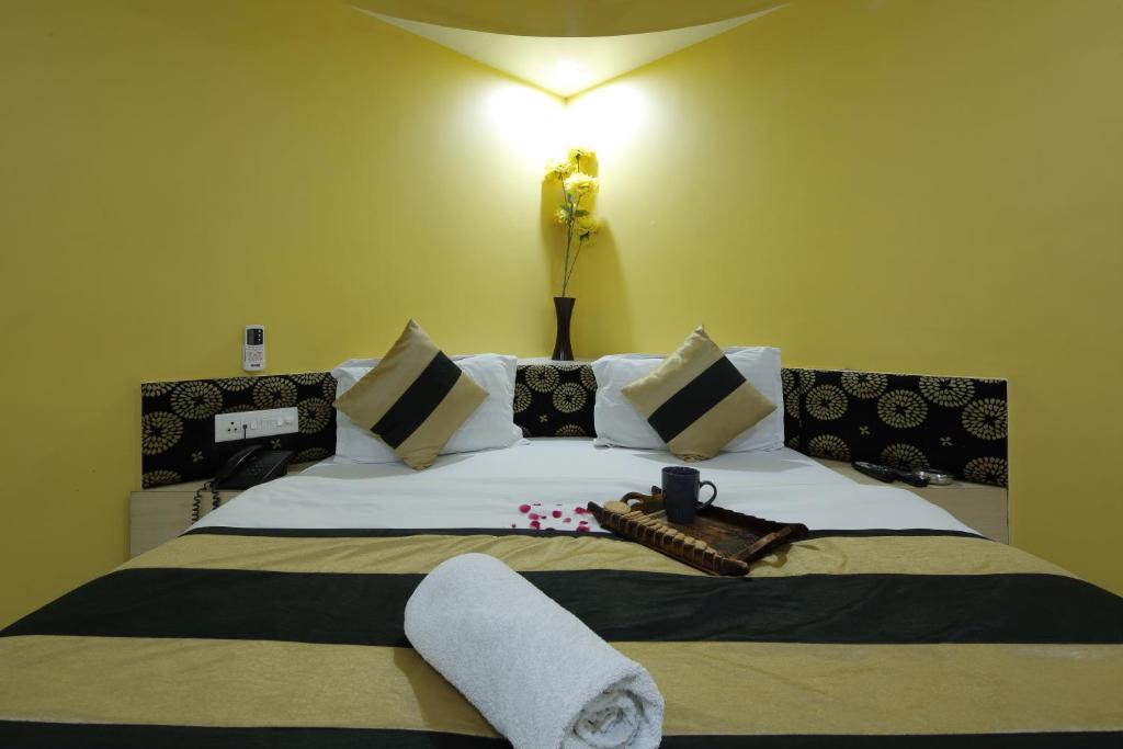 Postel nebo postele na pokoji v ubytování Hotel Volga