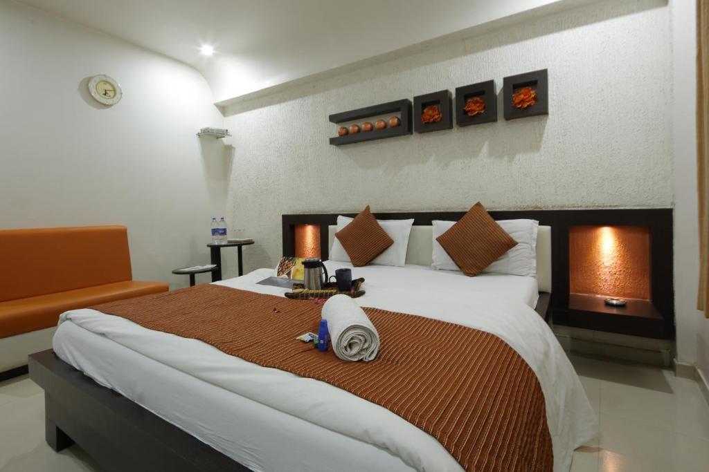 Postel nebo postele na pokoji v ubytování Hotel Volga