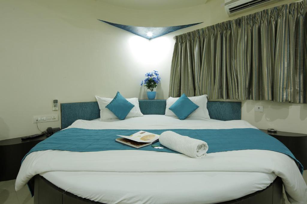 Postel nebo postele na pokoji v ubytování Hotel Volga