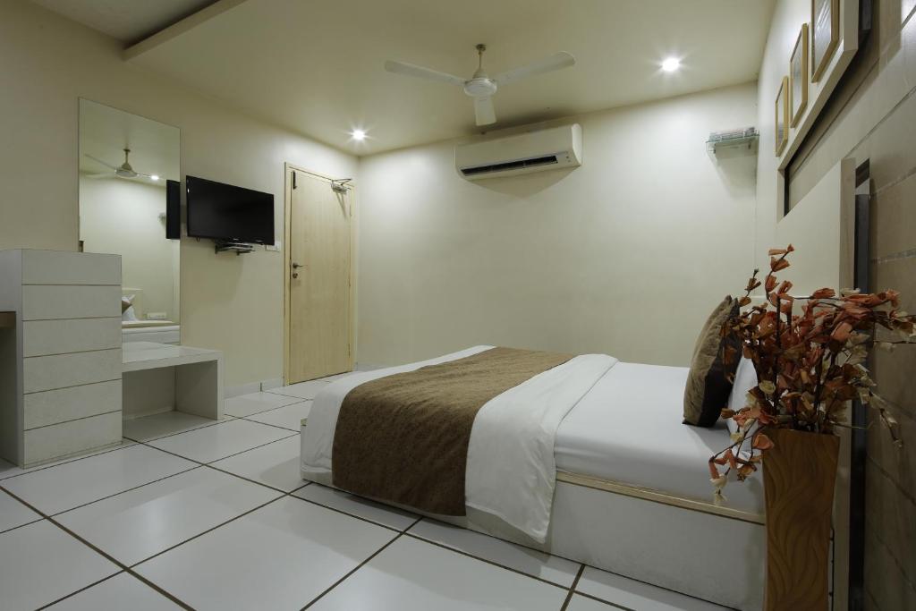 Postel nebo postele na pokoji v ubytování Hotel Volga