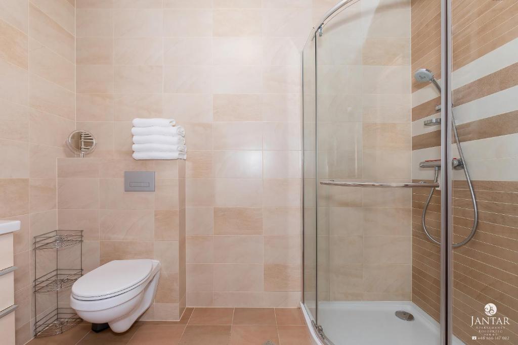 Koupelna v ubytování Jantar Apartamenty - Family Vacation Polanki