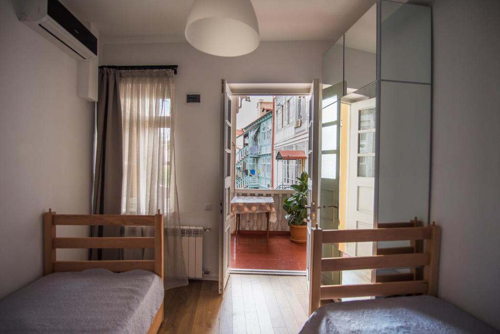 Postel nebo postele na pokoji v ubytování Meidan Suites