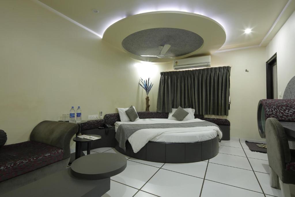 Postel nebo postele na pokoji v ubytování Hotel Volga