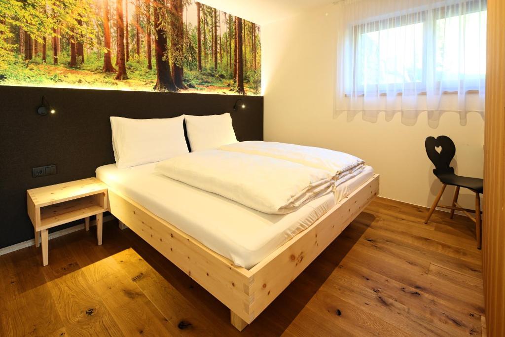 Posteľ alebo postele v izbe v ubytovaní Sunnig Nature Apartments