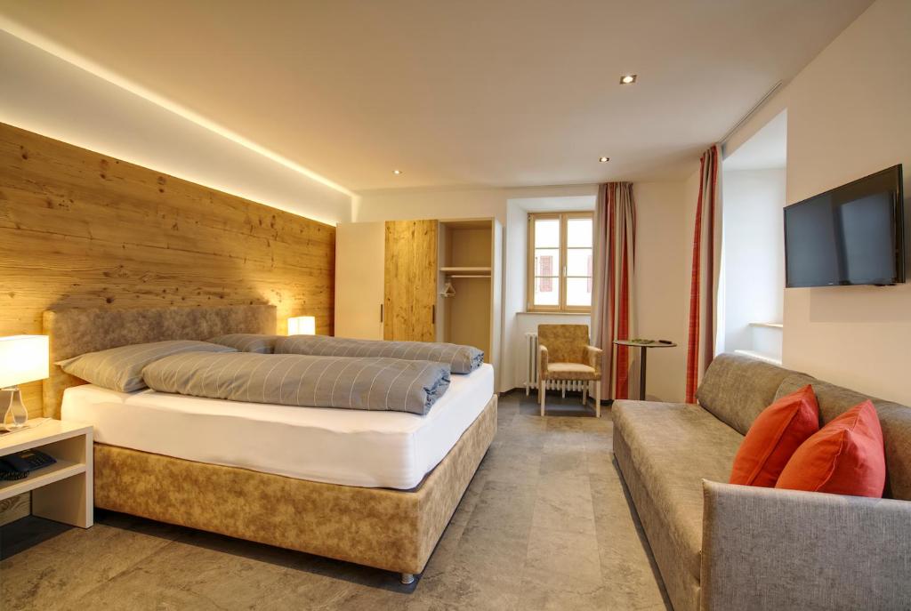 Postel nebo postele na pokoji v ubytování Hotel Bellevue