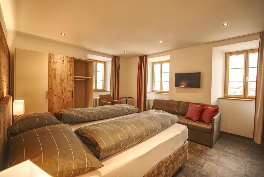 Postel nebo postele na pokoji v ubytování Hotel Bellevue